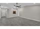Spacious living area with an open floor plan and access to kitchen, filled with natural light at 2028 Donegan Pl, Orlando, FL 32826