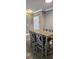 Dining room with gray wood style table and four chairs at 204 E South St # 4056, Orlando, FL 32801
