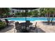 This beautiful pool includes lounge chairs and a table with chairs and an umbrella at 204 E South St # 4056, Orlando, FL 32801