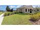 Community center featuring a new fence, grass area, and exterior paint at 2061 Rush Bay Way, Orlando, FL 32824
