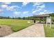 Community park featuring lush green grass and a picnic shelter at 2061 Rush Bay Way, Orlando, FL 32824