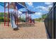 Community playground featuring state of the art equipment with blue canopies at 2061 Rush Bay Way, Orlando, FL 32824