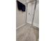 Modern bathroom shower with glass door, white tiling, and a sleek design at 2450 Sweet Viburnum Way, Ocoee, FL 34761