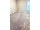 Clean bedroom with neutral carpeting, providing a blank canvas at 2450 Sweet Viburnum Way, Ocoee, FL 34761