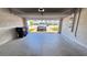 Spacious two-car garage with ample room for parking and storage at 2450 Sweet Viburnum Way, Ocoee, FL 34761