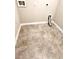 Empty laundry room with tile flooring and hookups ready for washer and dryer installation at 2450 Sweet Viburnum Way, Ocoee, FL 34761