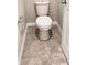 Close-up of a well-maintained toilet with a tile floor in a clean, modern bathroom setting at 2450 Sweet Viburnum Way, Ocoee, FL 34761
