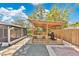 Backyard featuring an outdoor deck with grill, adjacent screened porch and stone path at 2460 Worthington Rd, Maitland, FL 32751