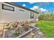 Landscaped garden with flower beds at 2460 Worthington Rd, Maitland, FL 32751