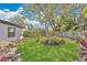 Green backyard with mature landscaping at 2460 Worthington Rd, Maitland, FL 32751