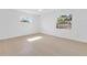 Bright bedroom featuring natural light and hardwood flooring at 2460 Worthington Rd, Maitland, FL 32751