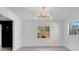 Bright living room with modern lighting and many windows at 2460 Worthington Rd, Maitland, FL 32751