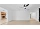 Large living room with ceiling fan and hardwood flooring at 2460 Worthington Rd, Maitland, FL 32751