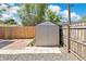 Backyard storage shed with neutral siding, perfect for organizing tools or equipment at 2460 Worthington Rd, Maitland, FL 32751
