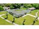This single-story home has a fenced yard and palm trees in the front at 2471 Greenwood St, Deltona, FL 32738