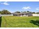 Spacious backyard featuring a well-maintained lawn and patio for outdoor entertaining at 2471 Greenwood St, Deltona, FL 32738