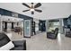 Spacious living room featuring recessed lighting, tile floors, and an open floor plan at 2471 Greenwood St, Deltona, FL 32738