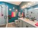This bathroom features a double sink vanity with white counter and bronze fixtures at 2619 Breezy Meadow Rd, Apopka, FL 32712