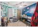 Creative ' bedroom with mountain climbing wall, loft bed, and unique decor at 2619 Breezy Meadow Rd, Apopka, FL 32712