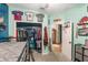 Youthful bedroom with sports-themed decor, loft bed, closet, and painted walls at 2619 Breezy Meadow Rd, Apopka, FL 32712