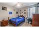 Charming bedroom with bed, desk, dresser, ceiling fan, and decor at 2619 Breezy Meadow Rd, Apopka, FL 32712