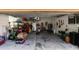 Well-lit garage provides ample space for storage and projects, keeping your vehicles safe and secure at 2619 Breezy Meadow Rd, Apopka, FL 32712