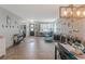 Open-concept space with tile flooring, neutral walls, and modern decor for comfortable living at 2619 Breezy Meadow Rd, Apopka, FL 32712