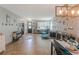 Open-concept space with tile flooring, neutral walls, and modern decor for comfortable living at 2619 Breezy Meadow Rd, Apopka, FL 32712