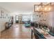 Open-concept space with tile flooring, neutral walls, and modern decor for comfortable living at 2619 Breezy Meadow Rd, Apopka, FL 32712