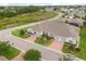 The property from above, highlighting the pristine landscaping, ample parking, and convenient access to nearby amenities at 3007 Caneel St, Winter Haven, FL 33884