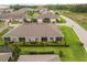 A bird's eye view reveals a meticulously landscaped property with a private screened patio and verdant surroundings at 3007 Caneel St, Winter Haven, FL 33884