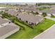 This aerial shot showcases a lush, well-maintained property with landscaping, ideal for outdoor relaxation and enjoyment at 3007 Caneel St, Winter Haven, FL 33884
