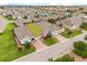 Inviting townhomes featuring a brick driveway and manicured lawns in a well-maintained community at 3007 Caneel St, Winter Haven, FL 33884