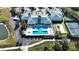 A luxurious community pool with lap lanes, jacuzzi, tennis courts, and clubhouse at 3007 Caneel St, Winter Haven, FL 33884