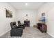 Spacious living room with comfortable seating, wood-look flooring, and stylish decor at 3007 Caneel St, Winter Haven, FL 33884