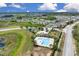 Aerial shot featuring a pool, playground, and landscaping within the community at 316 Primrose Dr, Davenport, FL 33837