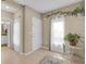 Inviting foyer with tile flooring, neutral walls, and plenty of natural light, creating a warm entrance at 316 Primrose Dr, Davenport, FL 33837