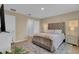 This is a comfortable main bedroom with a plush rug, neutral tones, and ample closet space at 316 Primrose Dr, Davenport, FL 33837