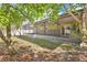 Backyard with a view of a screened-in porch and grass at 321 Thomasdale Ave, Haines City, FL 33844