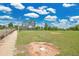 Community baseball field with a pitcher's mound and base at 321 Thomasdale Ave, Haines City, FL 33844