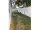 Backyard offering a private outdoor space, featuring a white privacy fence, perfect for relaxing or entertaining at 3347 Timberline W Rd, Winter Haven, FL 33880