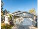 Charming single-story home with a well-maintained lawn and attached one car garage and neutral paint at 3347 Timberline W Rd, Winter Haven, FL 33880
