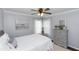 Cozy bedroom with a ceiling fan, neutral colors, and plenty of natural light at 341 Sprucewood Rd, Lake Mary, FL 32746