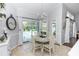 Charming dining area with views of the pool and backyard at 341 Sprucewood Rd, Lake Mary, FL 32746