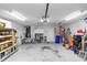 Well-organized garage with storage, bikes, and parking space at 341 Sprucewood Rd, Lake Mary, FL 32746