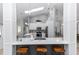 Open-concept kitchen featuring white cabinets and a kitchen island at 341 Sprucewood Rd, Lake Mary, FL 32746