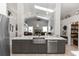 Modern kitchen overlooking living room, featuring a stainless steel dishwasher and sink at 341 Sprucewood Rd, Lake Mary, FL 32746