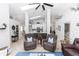 Large living room with multiple seating areas and skylight at 341 Sprucewood Rd, Lake Mary, FL 32746