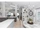 Open-concept living space features the kitchen, dining area, and living room at 341 Sprucewood Rd, Lake Mary, FL 32746
