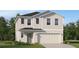 Charming two-story home with a well-manicured lawn and an attached two-car garage at 3507 Kimbrough Dr, Lake Wales, FL 33859
